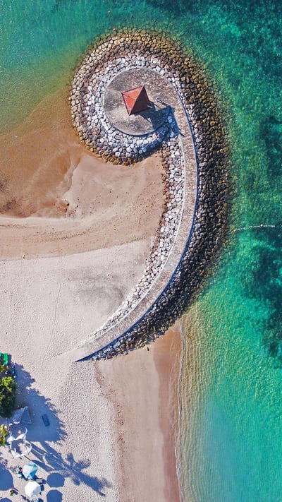 Nusa Dua coast with breakwater, Bali, Indonesia (© Dkart/Getty Images) mobile wallpaper