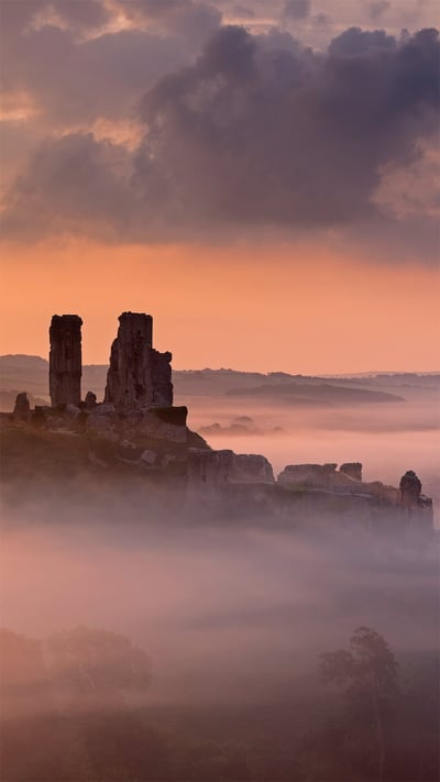 Corfe Castle, Dorset, England (© Ross Hoddinott/Minden Pictures) mobile wallpaper