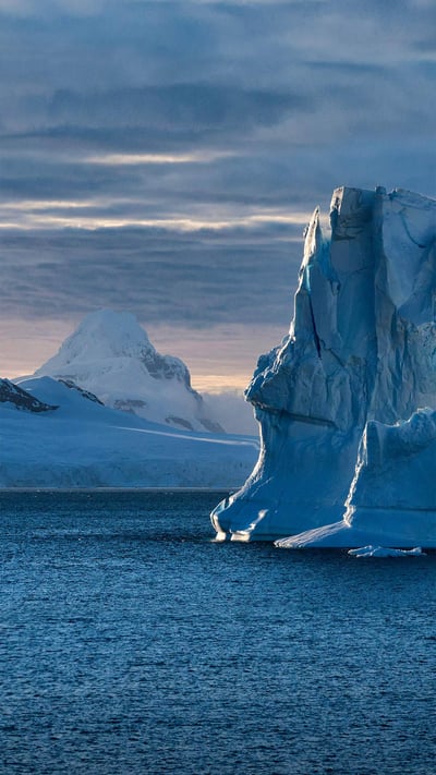 Blue icebergs near Cuverville Island, Antarctica (© Mike Hill/Getty Images) mobile wallpaper