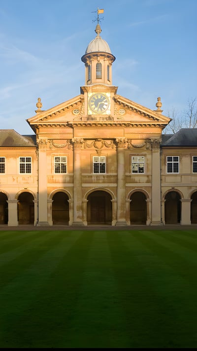 Clock tower of Emmanuel College, University of Cambridge, England (© Geography Photos/Universal Images Group/Getty Images) mobile wallpaper