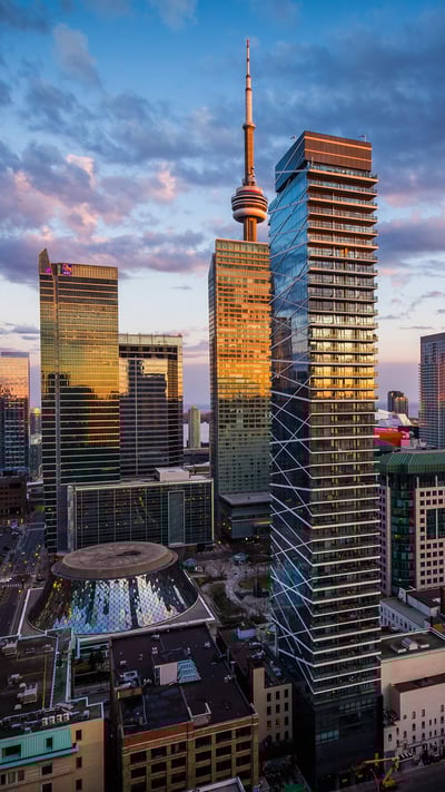 View of modern buildings at sunset in downtown Toronto (© Jon Bilous/Shutterstock) mobile wallpaper