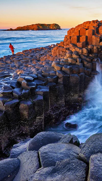 Fingal Head with a rock fisherman on the headland (© Auscape/UIG via Getty Images) mobile wallpaper
