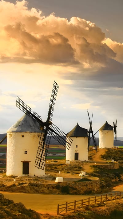Windmills in Castilla-La Mancha, Spain (© Getty Images) mobile wallpaper