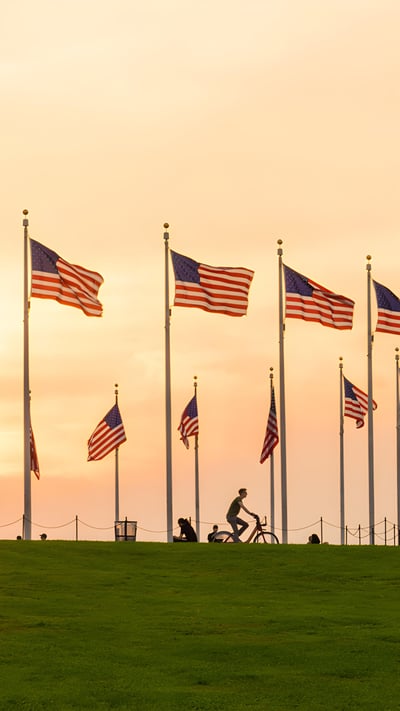 Flag display at the Washington Monument, Washington, DC (© tristanbnz/Adobe Stock) mobile wallpaper