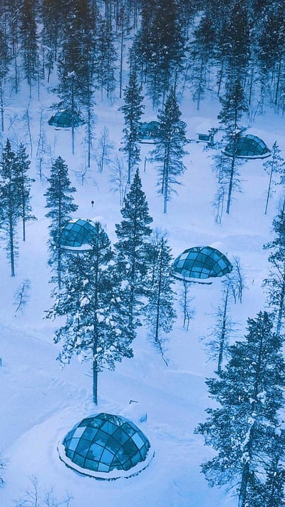 Glass igloos at the Kakslauttanen Arctic Resort in Saariselkä, Finland (© Lingxiao Xie/Getty Images) mobile wallpaper