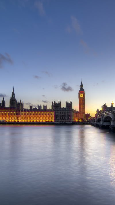 House of Parliament on the Thames, London, UK (© the Trinity/Getty Images) mobile wallpaper