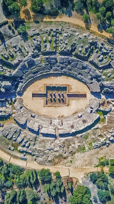The Roman amphitheater of Itálica, near Seville, Spain (© Amazing Aerial Agency/Offset by Shutterstock) mobile wallpaper