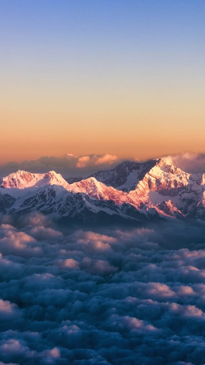 Kanchenjunga, on the India-Nepal border, among a sea of clouds at sunrise (© Alexander W Helin/Getty Images) mobile wallpaper