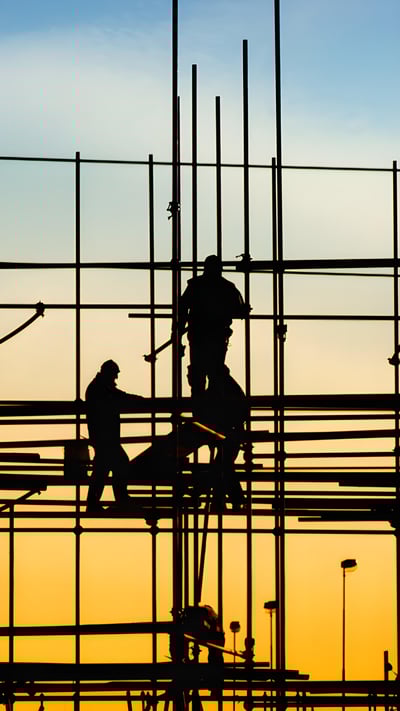 Construction workers on scaffolding (© Bits and Splits/Shutterstock) mobile wallpaper