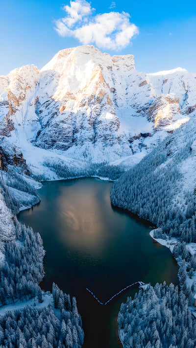 The Pragser Wildsee in the Dolomites, South Tyrol, Italy (© Marco Bottigelli/Getty Images) mobile wallpaper