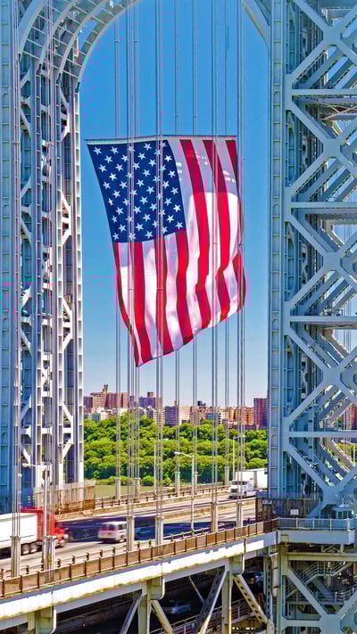 The George Washington Bridge displays the American flag in honor of Flag Day, June 14, 2016, Fort Lee, New Jersey (© Robert D. Barnes/Getty Images) mobile wallpaper