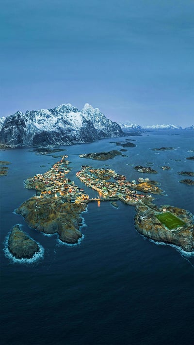 Fishing village of Henningsvær with Henningsvær Idrettslag Stadion, Nordland, Norway (© Viktor Posnov/Alamy) mobile wallpaper