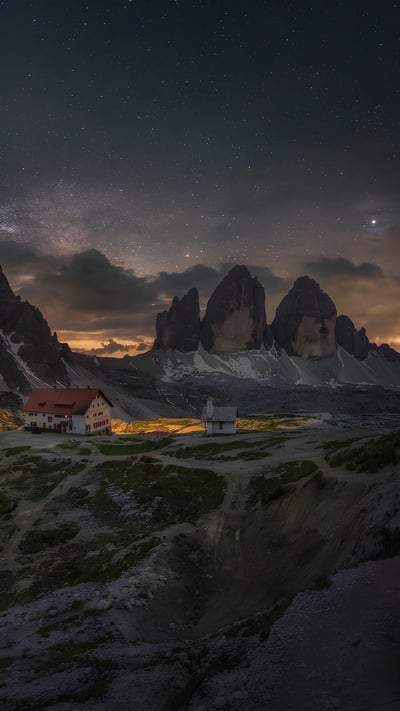 Milky Way above the Tre Cime di Lavaredo, South Tyrol, Italy (© Juan Romero/Cavan Images) mobile wallpaper