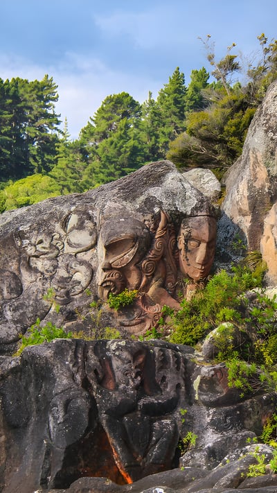 Ngātoroirangi Mine Bay Māori Rock Carvings on Lake Taupō, New Zealand (© Joppi/Getty Images) mobile wallpaper