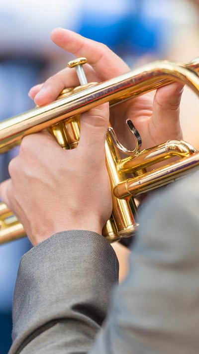 Close-up of a trumpet player's hands at Festival International de Jazz de Montréal (© Marc Bruxelle/Alamy Stock Photo) mobile wallpaper
