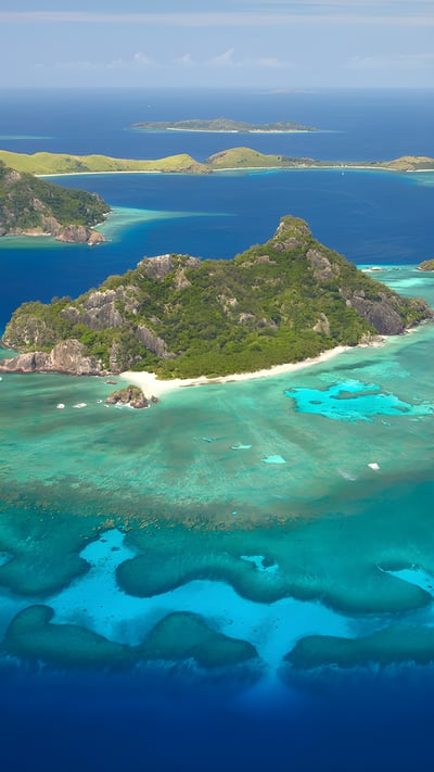 Coral reef surrounding the island of Monuriki, Mamanuca Islands, Fiji (© David Wall/SuperStock) mobile wallpaper