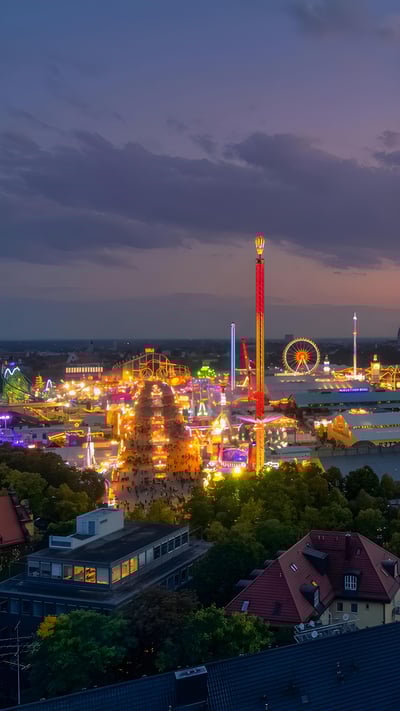 Oktoberfest in Munich, Germany, at sunset (© AllesSuper21/iStock/Getty Images) mobile wallpaper