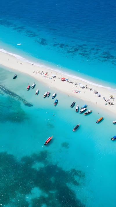 Sand bar in Nakupenda Beach Nature Reserve, Zanzibar, Tanzania (© Lubos Paukeje/Alamy) mobile wallpaper