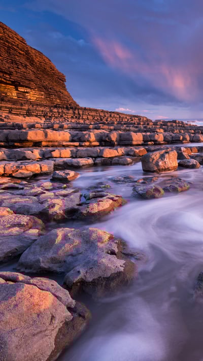 Sunset over Nash Point on the Glamorgan Heritage Coast, South Wales in winter. (© AWL Images/DanitaDelimont.com) mobile wallpaper
