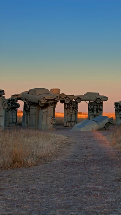Carhenge, created by Jim Reinders near Alliance, Nebraska (© Charlie Summers/Minden Pictures) mobile wallpaper