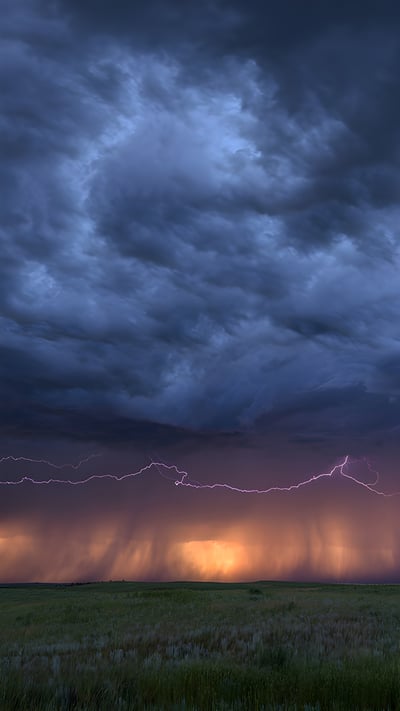 Lightning and storm clouds at sunset near Bowman, Nebraska (© john finney photography/Getty Images) mobile wallpaper