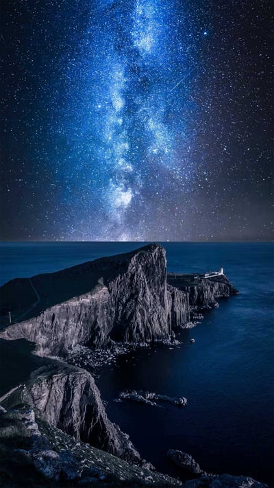 Milky Way over Neist Point Lighthouse, Isle of Skye, Scotland (© Shaiith/Getty Images) mobile wallpaper
