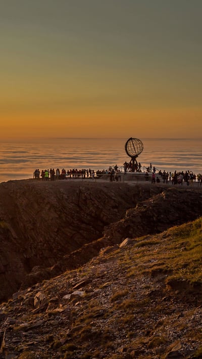 Midnight sun at North Cape, Norway (© Ron Bennett/Shutterstock) mobile wallpaper