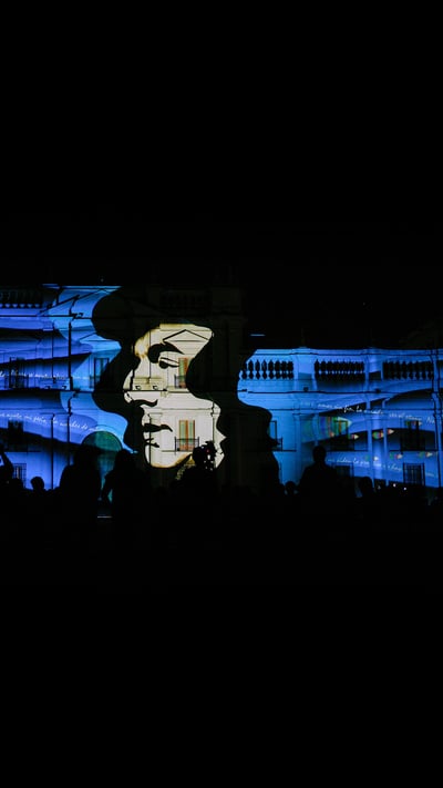 Portrait of poet Pablo Neruda projected on a building, Santiago, Chile (© Mario Tellez/Anadolu Agency/Getty Images) mobile wallpaper