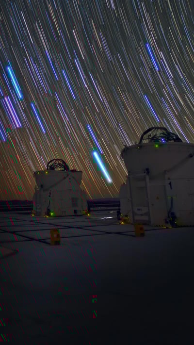 Telescopes and star trails at Paranal Observatory, Atacama Desert, Chile (© Matteo Omied/Alamy) mobile wallpaper