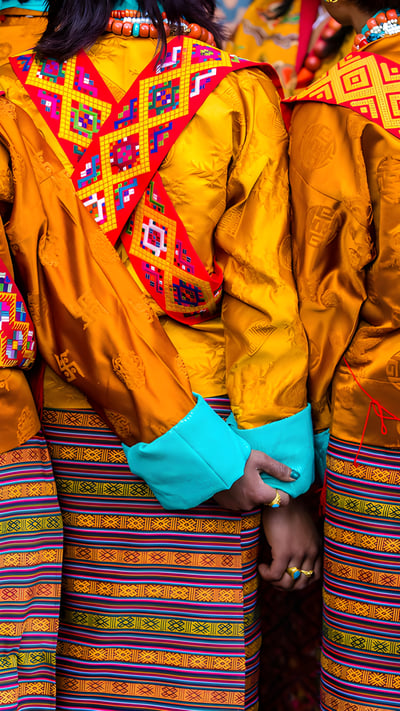 Women in traditional dress at the Paro Tshechu Festival in Bhutan (© Richard I'Anson/Getty Images) mobile wallpaper