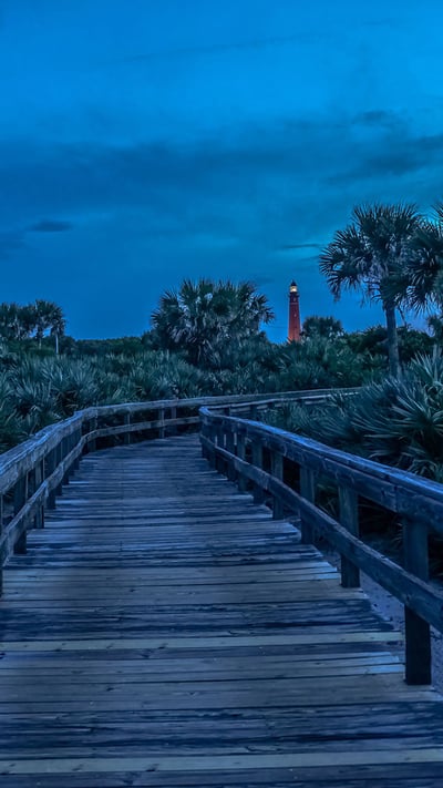 Looking inland from Ponce de León Inlet toward the lighthouse, Florida (© Jason Sponseller/Shutterstock) mobile wallpaper
