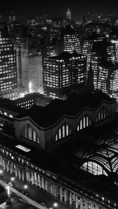 Aerial view of Penn Station and the New York City skyline at night in the 1950s (© R. Gates -Staff/Getty Images) mobile wallpaper