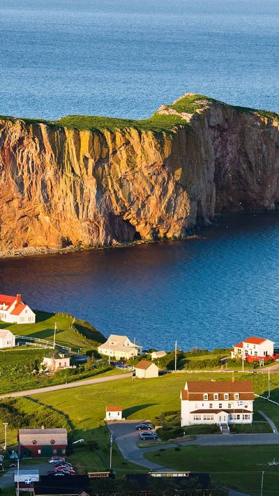 Percé Rock off the Gaspé Peninsula, Quebec (© Design Pics/DanitaDelimont.com) mobile wallpaper