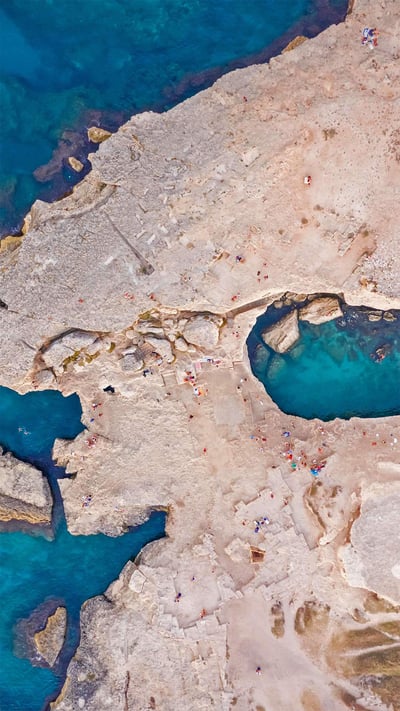 Aerial view of the Grotta della Poesia (Poetry's Cave) near Roca, Lecce, Italy (© Amazing Aerial Agency/Offset by Shutterstock) mobile wallpaper