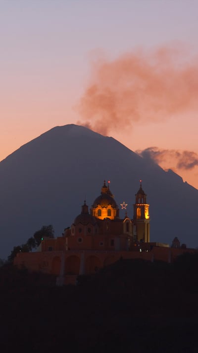 Church of Nuestra Señora de los Remedios and Popocatépetl, Puebla, Mexico (© Radius Images/Shutterstock) mobile wallpaper