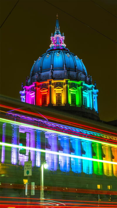 San Francisco City Hall lit with rainbow lights for Pride (© Wonwoo Lee/Getty Images) mobile wallpaper