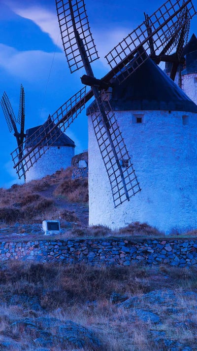 Windmills in the province of Toledo, Spain (© Jon Arnold/Danita Delimont) mobile wallpaper