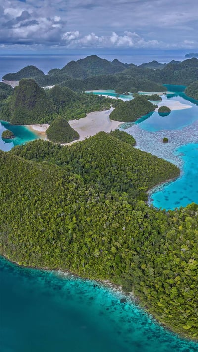 Raja Ampat, an archipelago in Indonesia (© Amazing Aerial Agency/Offset by Shutterstock) mobile wallpaper