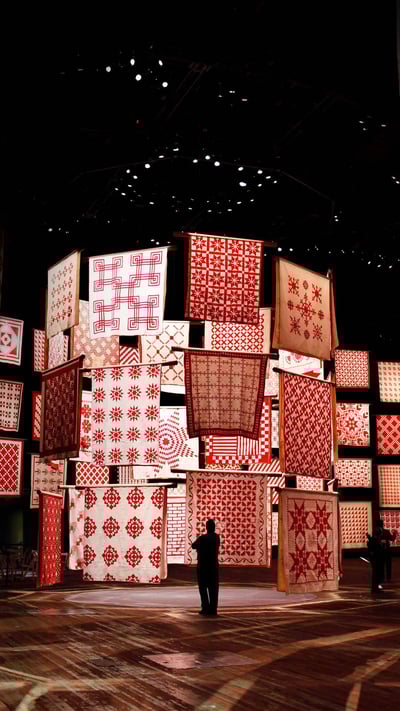 'Infinite Variety: Three Centuries of Red and White Quilts' at the American Folk Art Museum in New York City in 2011, for National Quilting Day (© Shannon Stapleton/Reuters) mobile wallpaper