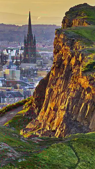 Salisbury Crags in Holyrood Park overlooking Edinburgh, Scotland (© Andrew Merry/Getty Images) mobile wallpaper