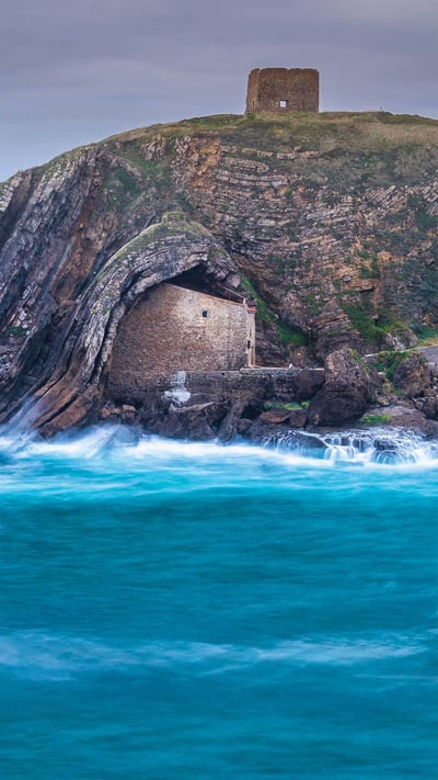 The chapel and hermitage of Santa Justa in Cantabria, Spain (© Luis Miguel Martin/Getty Images) mobile wallpaper