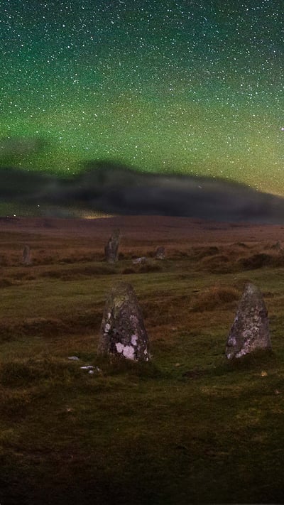 Dartmoor's Scorhill Stone Circle under a starry night sky, Devon. (© Matt Stansfield/Getty Images) mobile wallpaper