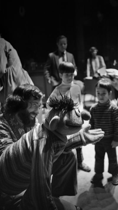 Jim Henson, along with Ernie and Bert, rehearses for an episode of 'Sesame Street' in 1970 in New York City (© David Attie/Getty Images) mobile wallpaper