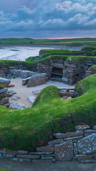 Stormy sky over Skara Brae, a Neolithic village on the Mainland, Orkney (© Robert Harding World Imagery/Offset) mobile wallpaper