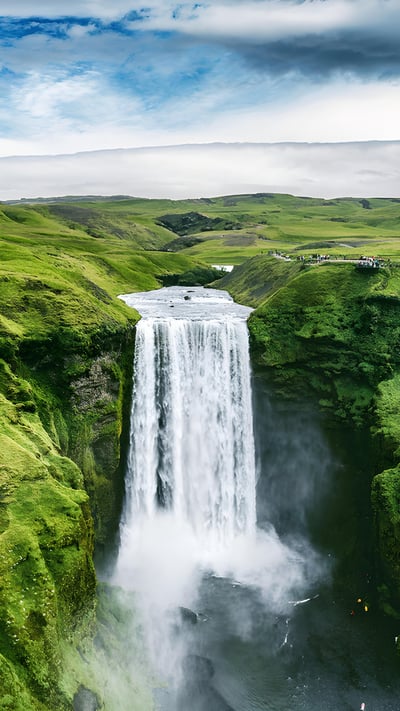 Skógafoss waterfall, Iceland (© Maridav/Shutterstock) mobile wallpaper