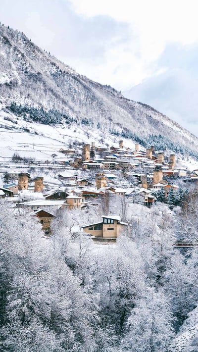 Medieval towers in Mestia, Upper Svaneti, Georgia (© photoaliona/Getty Images) mobile wallpaper