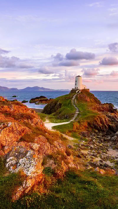 Tŵr Mawr lighthouse on Llanddwyn Island, Anglesey, Wales (© Joe Daniel Price/Getty Images) mobile wallpaper