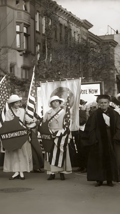 Dr. Anna Howard Shaw leading a suffrage parade in 1910s New York City (© Bettmann/Getty Images) mobile wallpaper