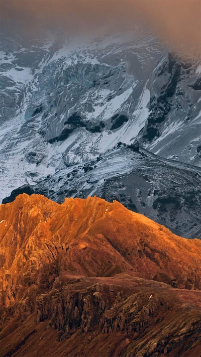 Sunlit ridges against volcanic scree on Eyjafjallajökull, a volcano in Iceland (© Erlend Haarberg/Minden Pictures) mobile wallpaper