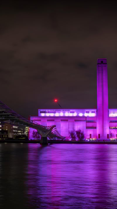 Tate Modern lit up for International Women's Day, London, England (© Stephen Chung/Alamy Stock Photo) mobile wallpaper